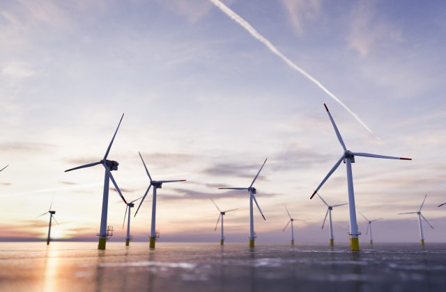 Offshore wind power and energy farm with many wind turbines on the ocean. Sustainable electricity production